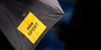SOLIHULL, ENGLAND - SEPTEMBER 30: The BBC sport television logo on an umbrella during the Vitality Women's FA Cup Semi Final match between Birmingham City and Everton on September 30, 2020 in Solihull, England. Sporting stadiums around the UK remain under strict restrictions due to the Coronavirus Pandemic as Government social distancing laws prohibit fans inside venues resulting in games being played behind closed doors.