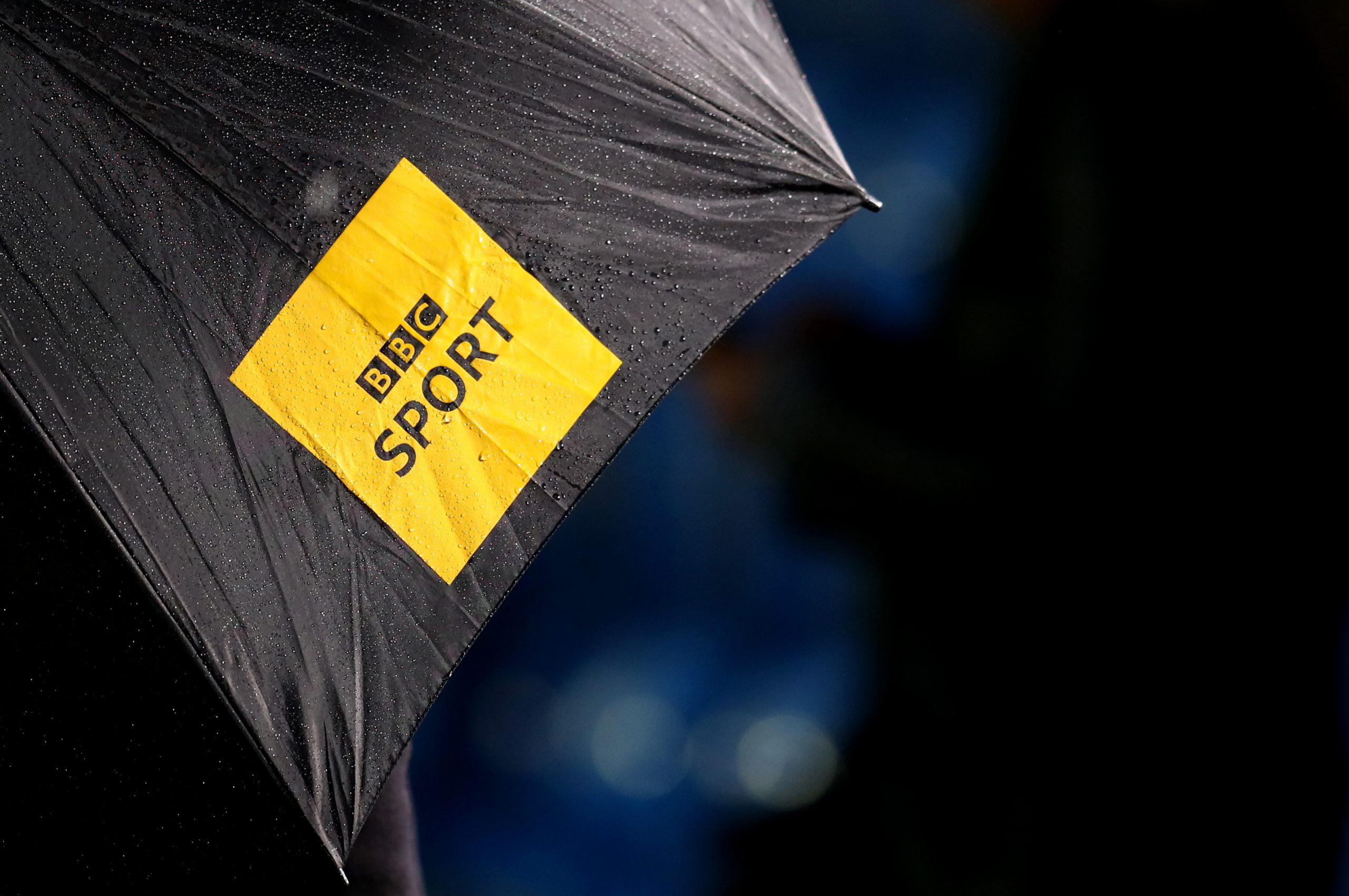 SOLIHULL, ENGLAND - SEPTEMBER 30: The BBC sport television logo on an umbrella during the Vitality Women's FA Cup Semi Final match between Birmingham City and Everton on September 30, 2020 in Solihull, England. Sporting stadiums around the UK remain under strict restrictions due to the Coronavirus Pandemic as Government social distancing laws prohibit fans inside venues resulting in games being played behind closed doors.