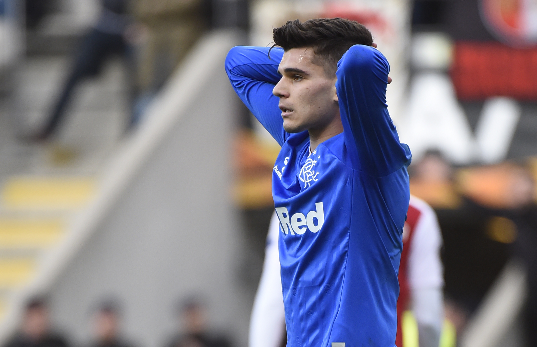 Rangers' Romanian midfielder Ianis Hagi reacts to missing a chance to score a goal during the UEFA Europa League round of 32 second leg football match between SC Braga and Rangers at the Municipal stadium in Braga on February 26, 2020.