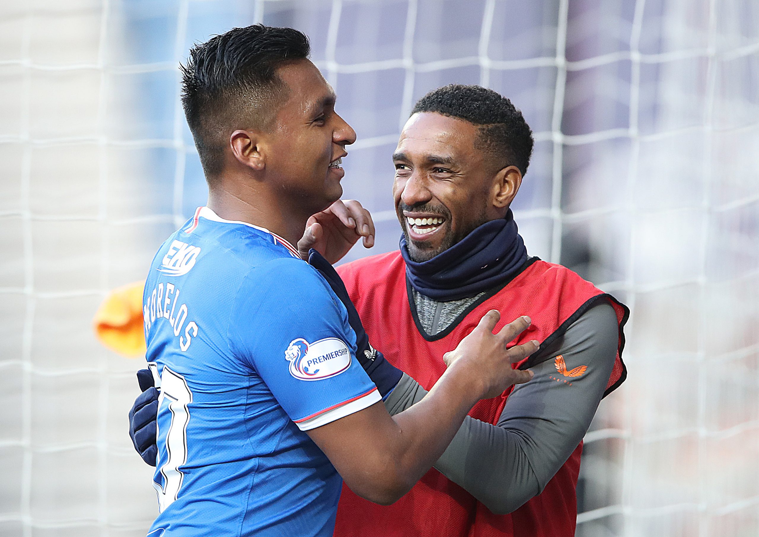 GLASGOW, SCOTLAND - FEBRUARY 21: Alfredo Morelos of Rangers celebrates with Jermain Defoe of Rangers after he scores his sides fourth goal during the Ladbrokes Scottish Premier League match between Rangers and Dundee United at Ibrox Stadium on February 21, 2021 in Glasgow, Scotland. Sporting stadiums around the UK remain under strict restrictions due to the Coronavirus Pandemic as Government social distancing laws prohibit fans inside venues resulting in games being played behind closed doors.