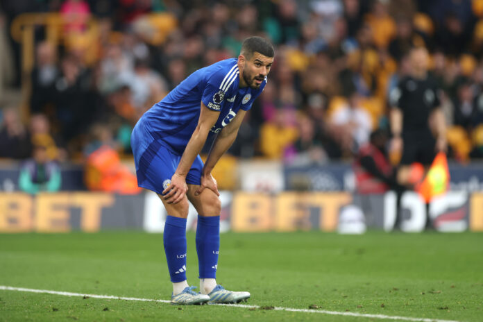 Wolverhampton Wanderers FC v Leicester City FC - Premier League Conor Coady of Leicester City bending forward during a Premier League match against Wolves at Molineux Stadium.