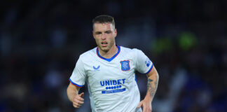 Leon King running during Rangers pre-season match vs Birmingham City in white Castore away strip