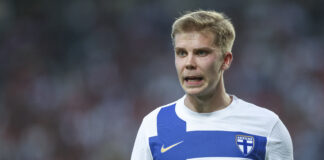 Oliver Antman in action for Finland wearing the number 11 shirt during an international match.