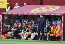 Major Billy Dodds Rangers admission is huge lesson to Russell Martin Rangers manager Russell Martin stands in front of the dugout at Fir Park during a match against Motherwell, with players and staff seated behind him.
