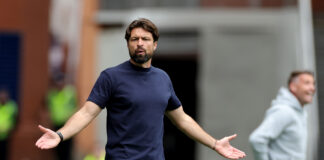 Russell Martin gestures in frustration during a Rangers pre-season friendly match.