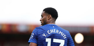 Youssef Chermiti wearing Everton’s number 17 shirt during a match, viewed from behind.