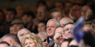 Walter Smith applauding among the Ibrox crowd during Rangers v Hearts