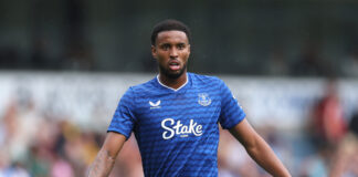 Everton striker Youssef Chermiti in action wearing the club’s blue home kit during a match.