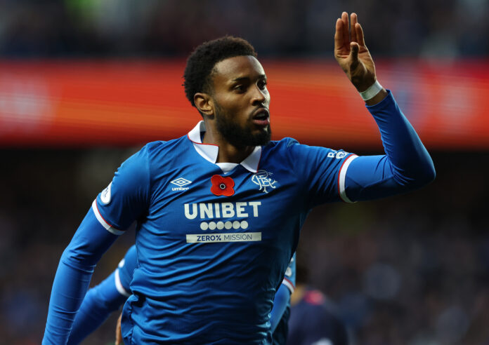 Youssef Chermiti appears to gesture at his criticis after scoring for Rangers.