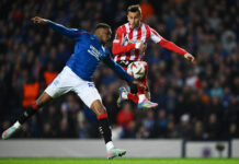 Dujon Sterling challenges an Athletic Club player during Rangers’ Europa League match at Ibrox, highlighting his strength and defensive power.