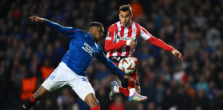 Dujon Sterling challenges an Athletic Club player during Rangers’ Europa League match at Ibrox, highlighting his strength and defensive power.