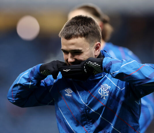 Rangers midfielder Nico Raskin warms up ahead of Hibernian clash at Ibrox