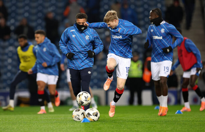 Lyall Cameron controls the ball during Rangers pre match warm up at Ibrox