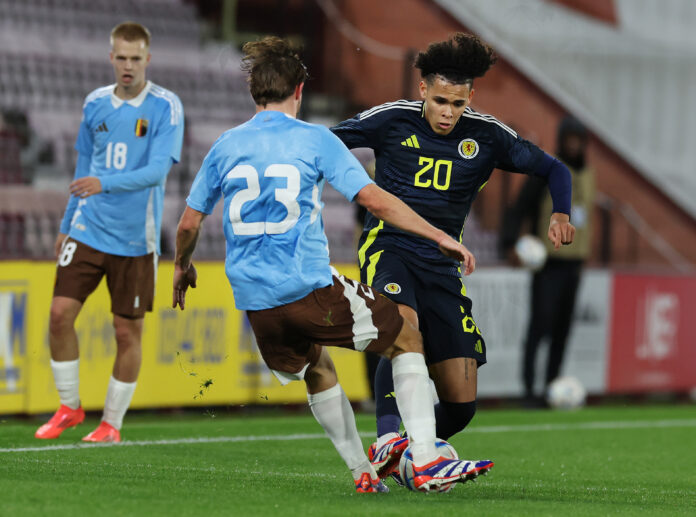 Tuur Rommens of Belgium vies with Jeremiah Mullen of Scotland