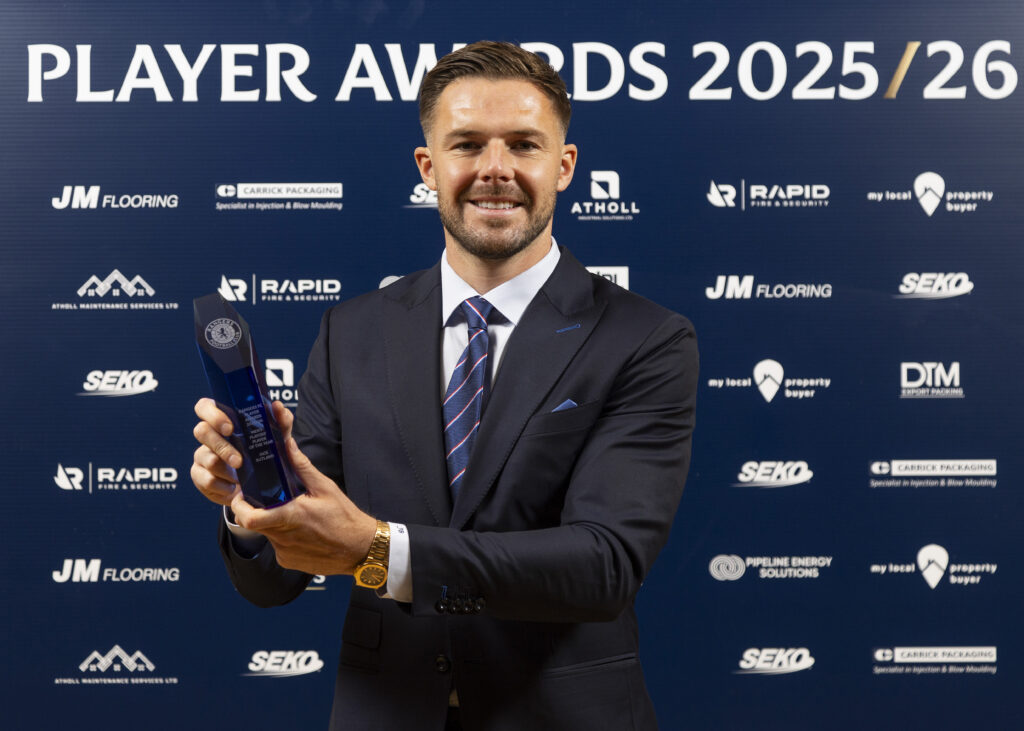 Jack Butland holding Rangers Players’ Player of the Year award at the 2025/26 ceremony
