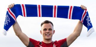 Rangers' new number 7 Lawrence proudly parades the shirt.