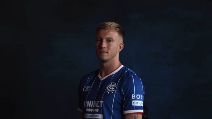 Ross McCrories First RangersTV Interview following his return.mp4_snapshot_00.00.209 Ross McCrorie poses during his first Rangers TV interview after returning to Rangers at Ibrox