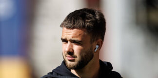 Rangers midfielder Nicolas Raskin arrives at an away match.