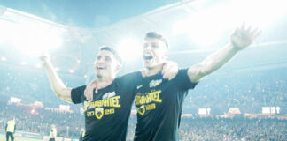 James Penrice and Petros Mantalos celebrate AEK s Greek Super League title