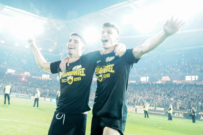 AEK Clinch Greek Super League Title James Penrice and Petros Mantalos celebrate AEK s Greek Super League title