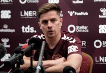 Hearts midfielder Cammy Devlin delivering a press conference amid his move to Rangers.