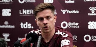 Hearts midfielder Cammy Devlin delivering a press conference amid his move to Rangers.