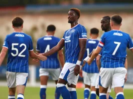 Rangers threadbare at the back as defence becomes critical Findlay Curtis and the Rangers players celebrate his goal.