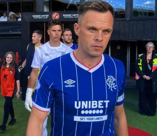 Rangers captain Lawrence Shankland leads the team out at Tannadice.