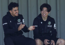 Rangers signing Daisuke Yokota sits at the side for current club Hannover.
