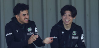 Rangers signing Daisuke Yokota sits at the side for current club Hannover.