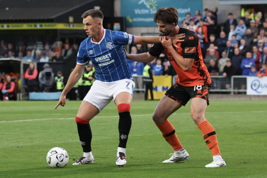 Dundee United versus Rangers Lawrence Shankland of Rangers holds off Michael Forbes of Dundee United